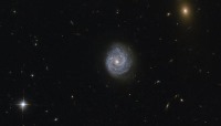 تصویر زیبای هابل از یک کهکشان مارپیچ رازآلود